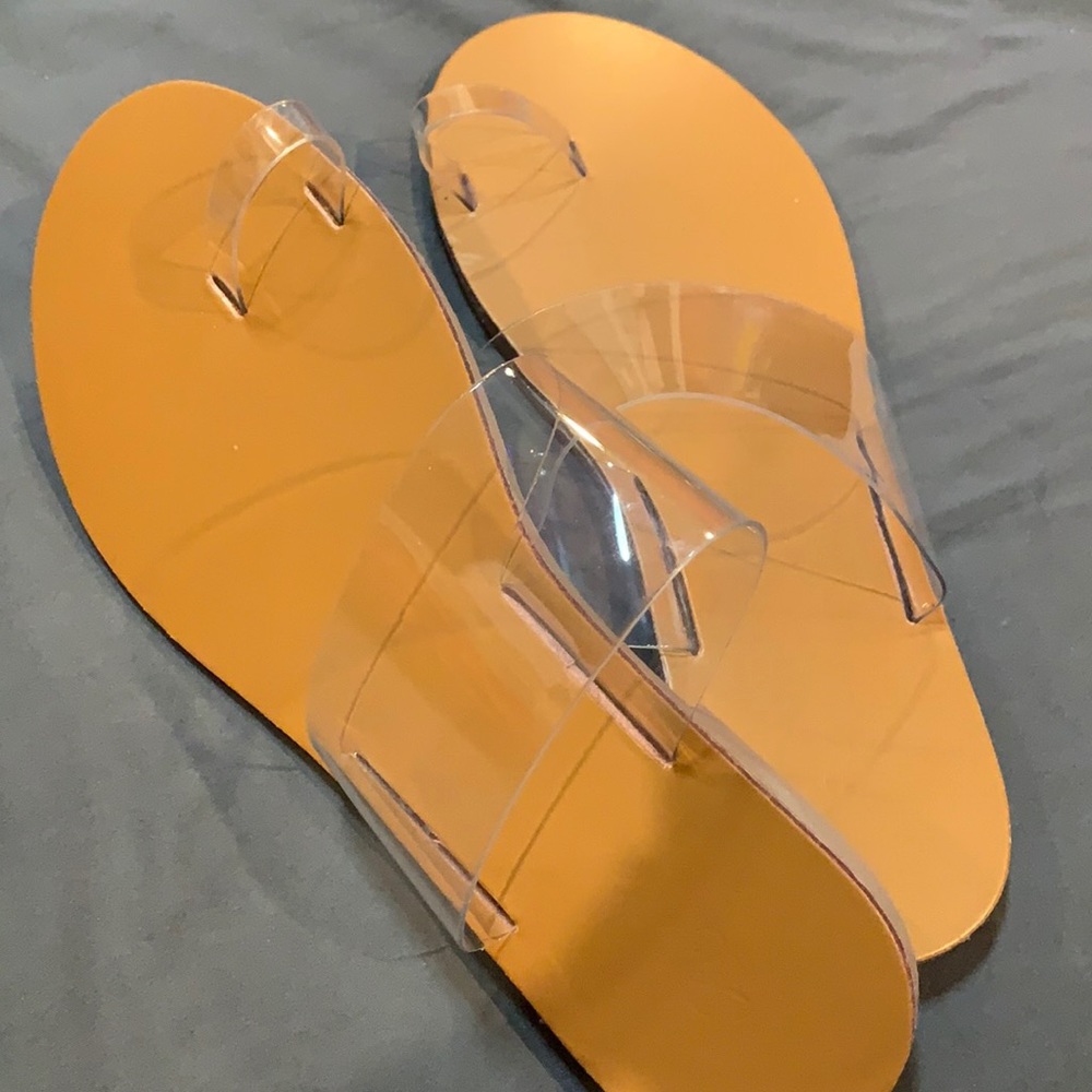 Woman’s Clear slippers (never worn)